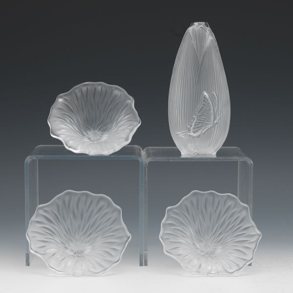 Appraisal: THREE LALIQUE FLOWER PAPERWEIGHTS AND A VASE Three flower paperweights