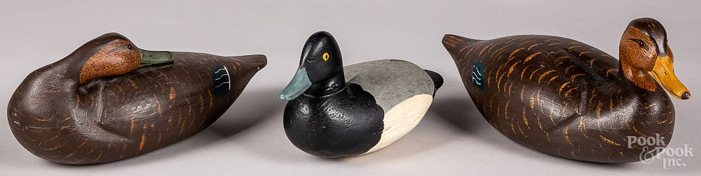 Appraisal: Pair of George Combs duck decoys Pair of George Combs