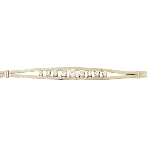 Appraisal: A diamond bracelet with a line of nine round brilliant