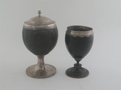 Appraisal: A George III mounted coconut goblet and cover with a