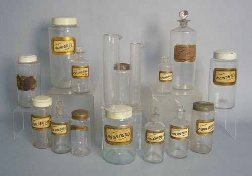 Appraisal: Fourteen blown glass apothecary bottles together with two measuring beakers