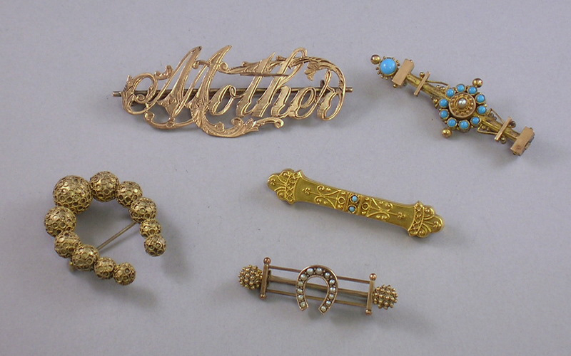 Appraisal: Five Gold and Gold-tone Victorian Brooches one kt gold and