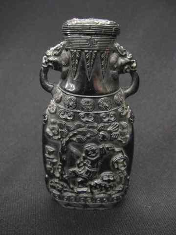 Appraisal: Chinese Carved Black Amber Snuff Bottle villagers animal in fancy