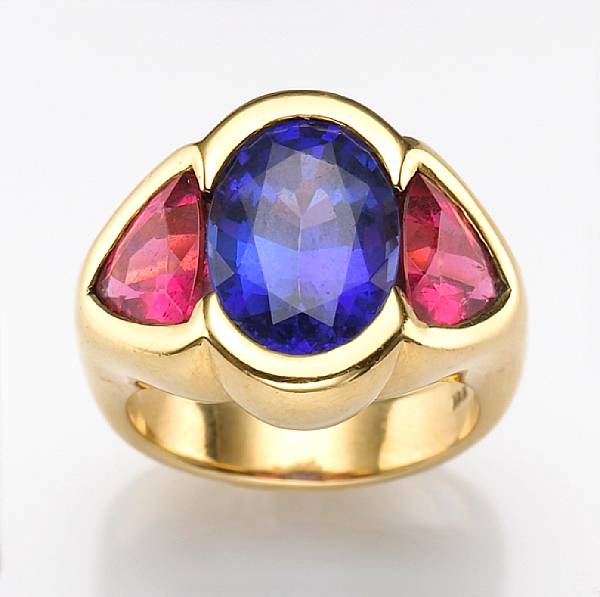 Appraisal: A tanzanite and pink tourmaline three stone ring oval-shaped tanzanite