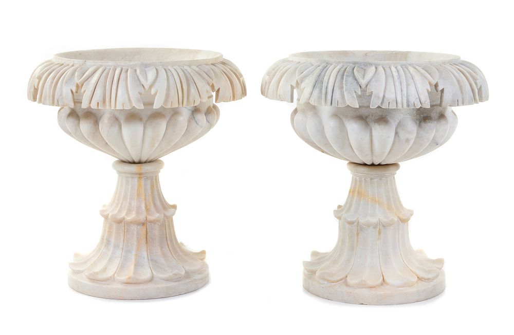 Appraisal: A Pair of Carved Marble Urns A Pair of Carved