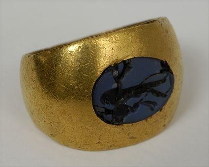 Appraisal: ROMAN GOLD RING SET WITH NICOLO INTAGLIO Approx sixe Provenance