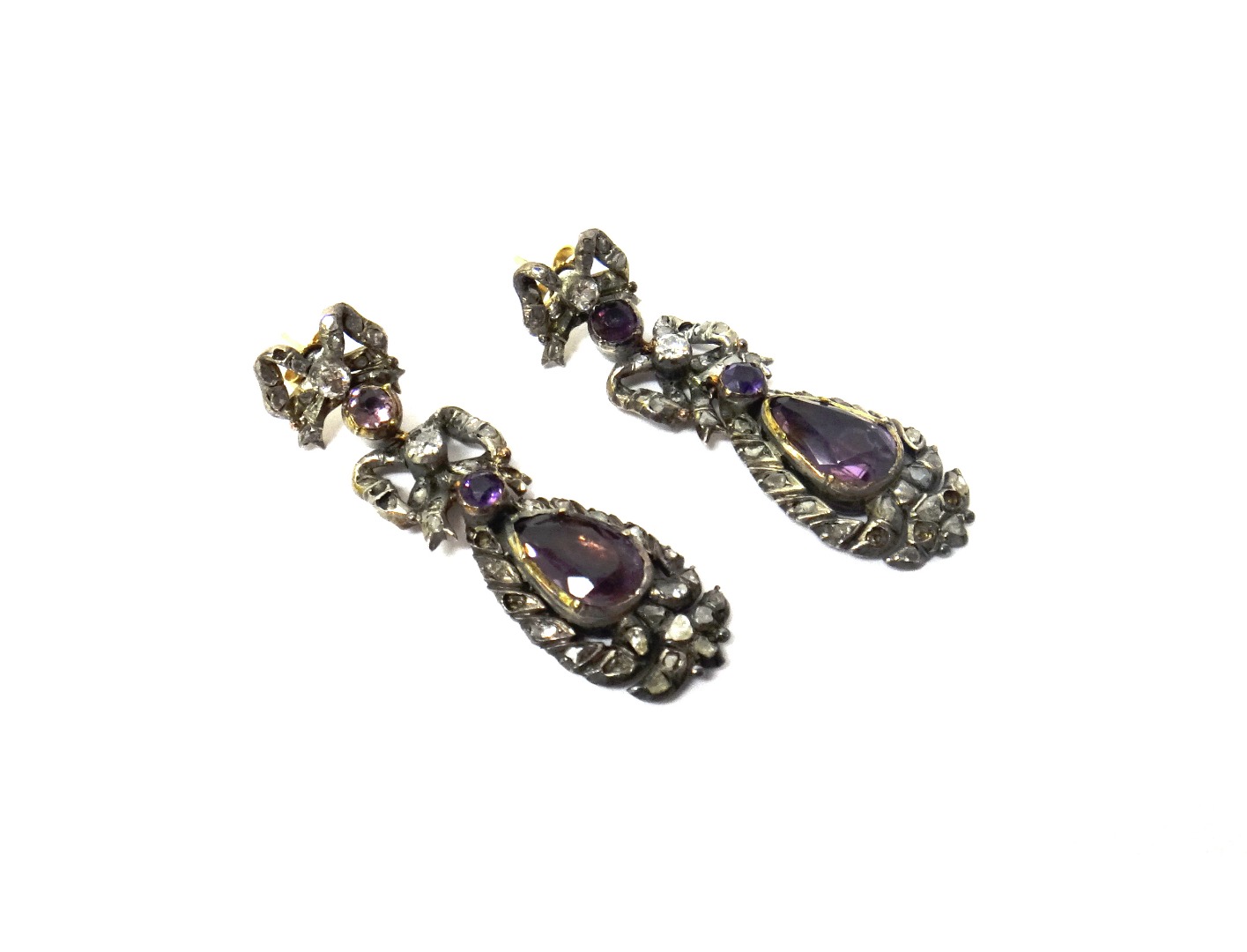 Appraisal: A pair of diamond and foil backed amethyst set pendant