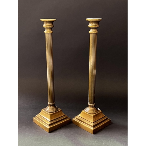 Appraisal: Pair of brass column candlesticks approx cm H