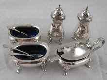 Appraisal: A five piece silver condiment set comprising two salts two