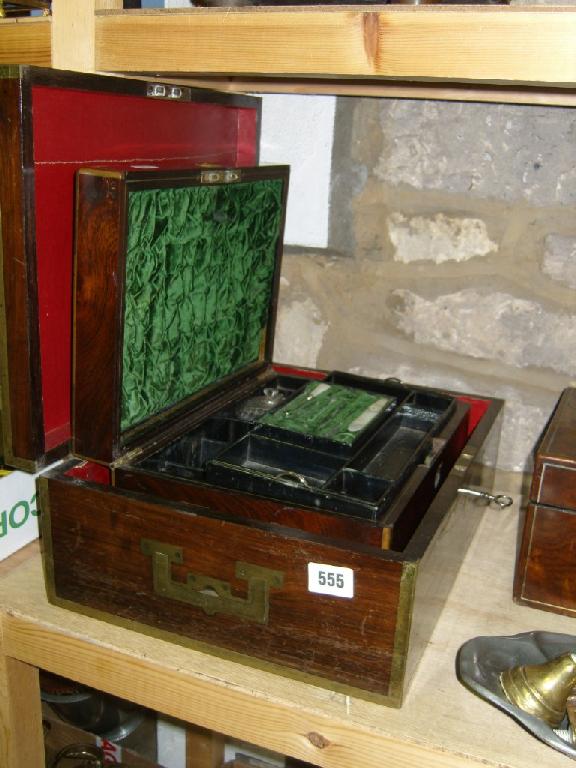 Appraisal: A Victorian rosewood brass mounted dressing case with fitted interior