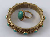 Appraisal: A Soviet Russian hallmarked silver and turquoise bangle with a