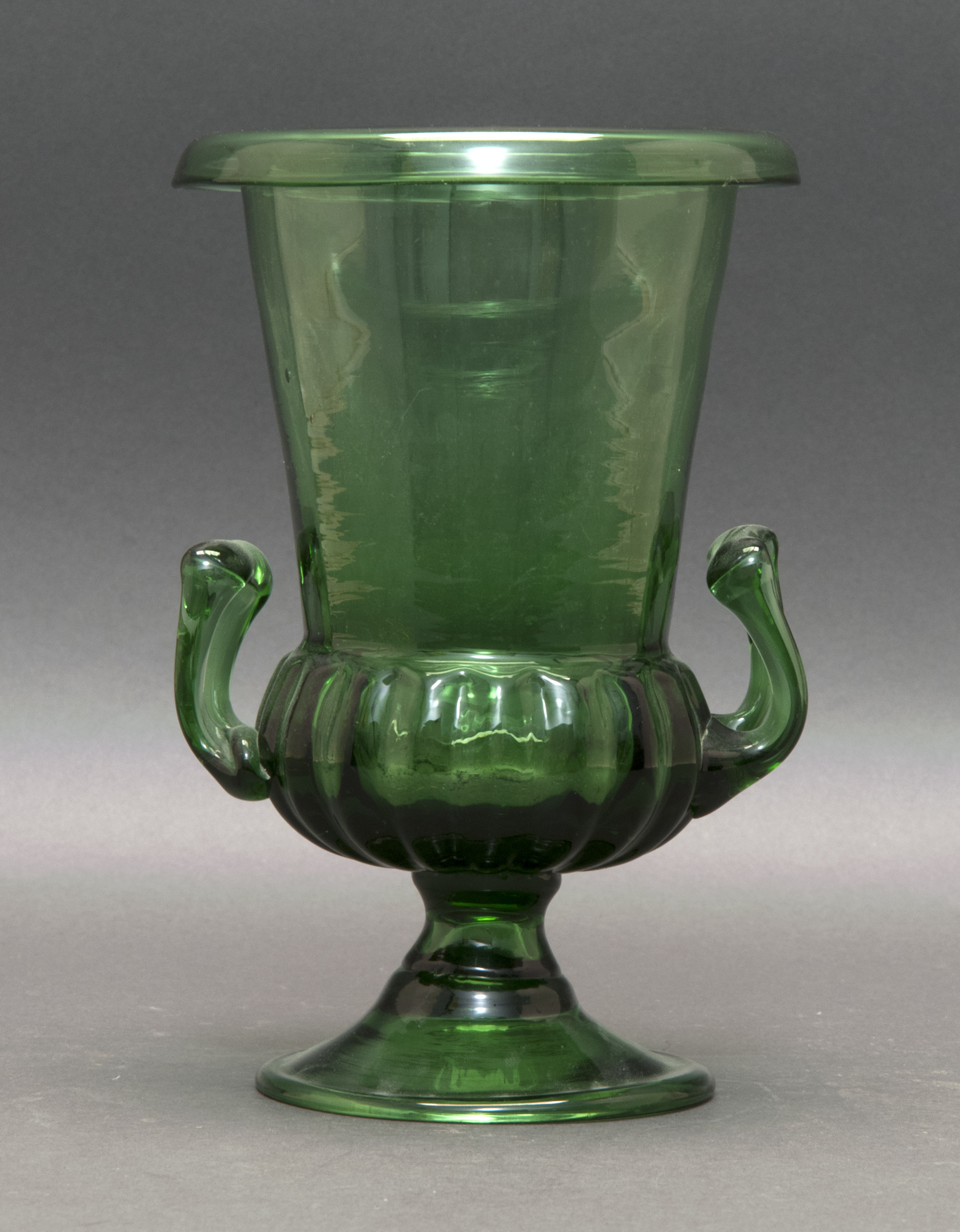 Appraisal: BLOWN GLASS URN Late th Early th CenturyIn emerald green