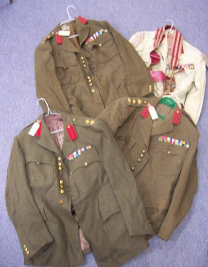 Appraisal: Sundry uniform jackets embroidered epaulette' badges etc