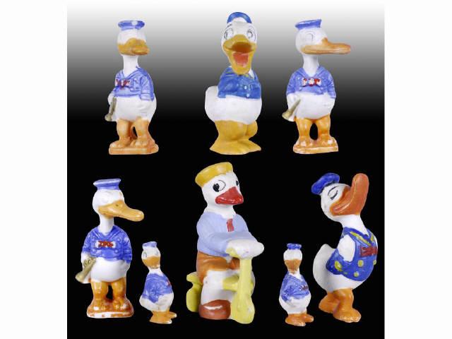 Appraisal: Lot of Japanese Walt Disney Bisque Donald Duck Description Various