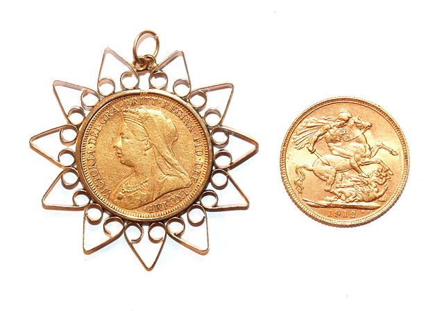 Appraisal: A GOLD SOVEREIGN and a Sydney mint gold sovereign mounted