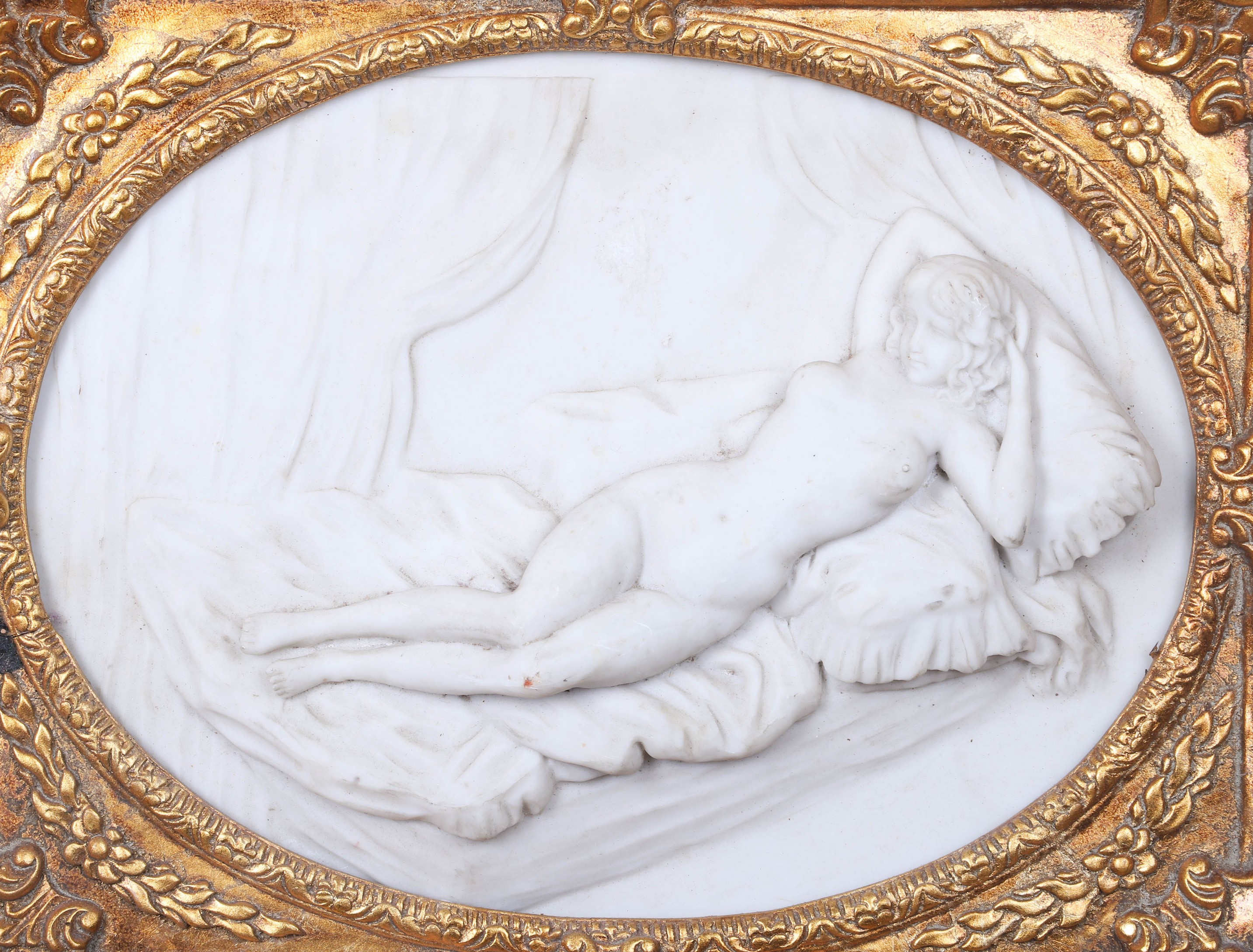 Appraisal: Carved alabaster relief plaque reclining nude woman in ornate gilt