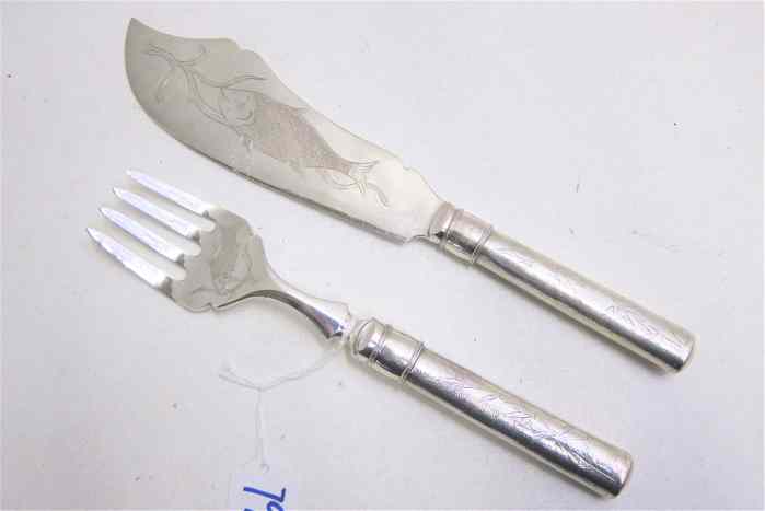 Appraisal: TWO PIECE JAPANESE STERLING SILVER FISH SET serving flatware having