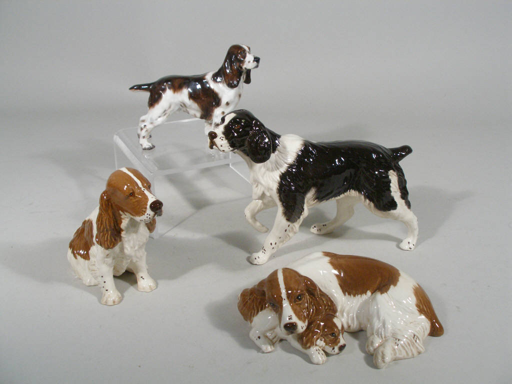 Appraisal: Royal Doulton Dogs Set of Four four Spaniels two standing