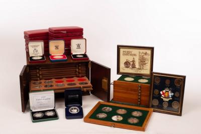 Appraisal: Two coin collector's cabinets and a variety of proof coins