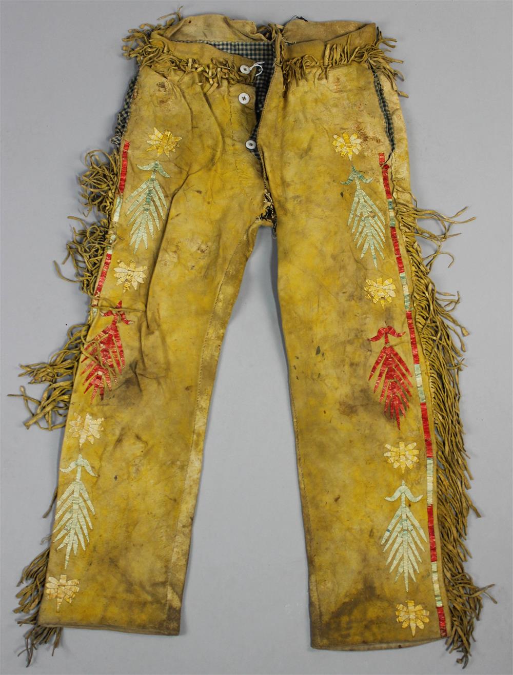 Appraisal: PAIR OF PLAINS BOY'S QUILLED AND FRINGED PANTS Northern multicolored