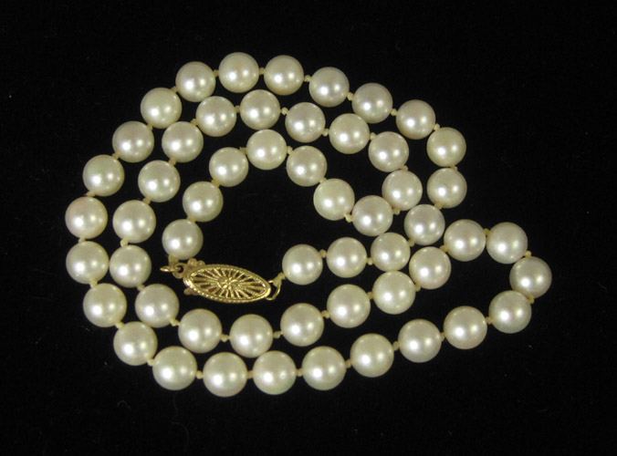 Appraisal: CHOKER LENGTH PEARL NECKLACE featuring well matched round pearls to