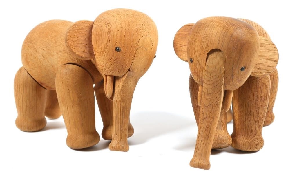 Appraisal: Two Mid Century Modern carved wood toy elephants with articulated