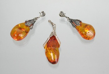 Appraisal: An Amber and Sterling Silver Pendant and Earrings In similar