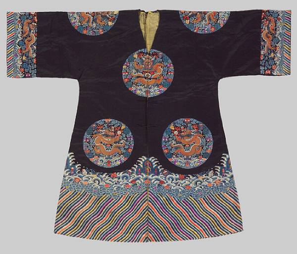 Appraisal: A black satin ground lady's coat with embroidered dragon medallions