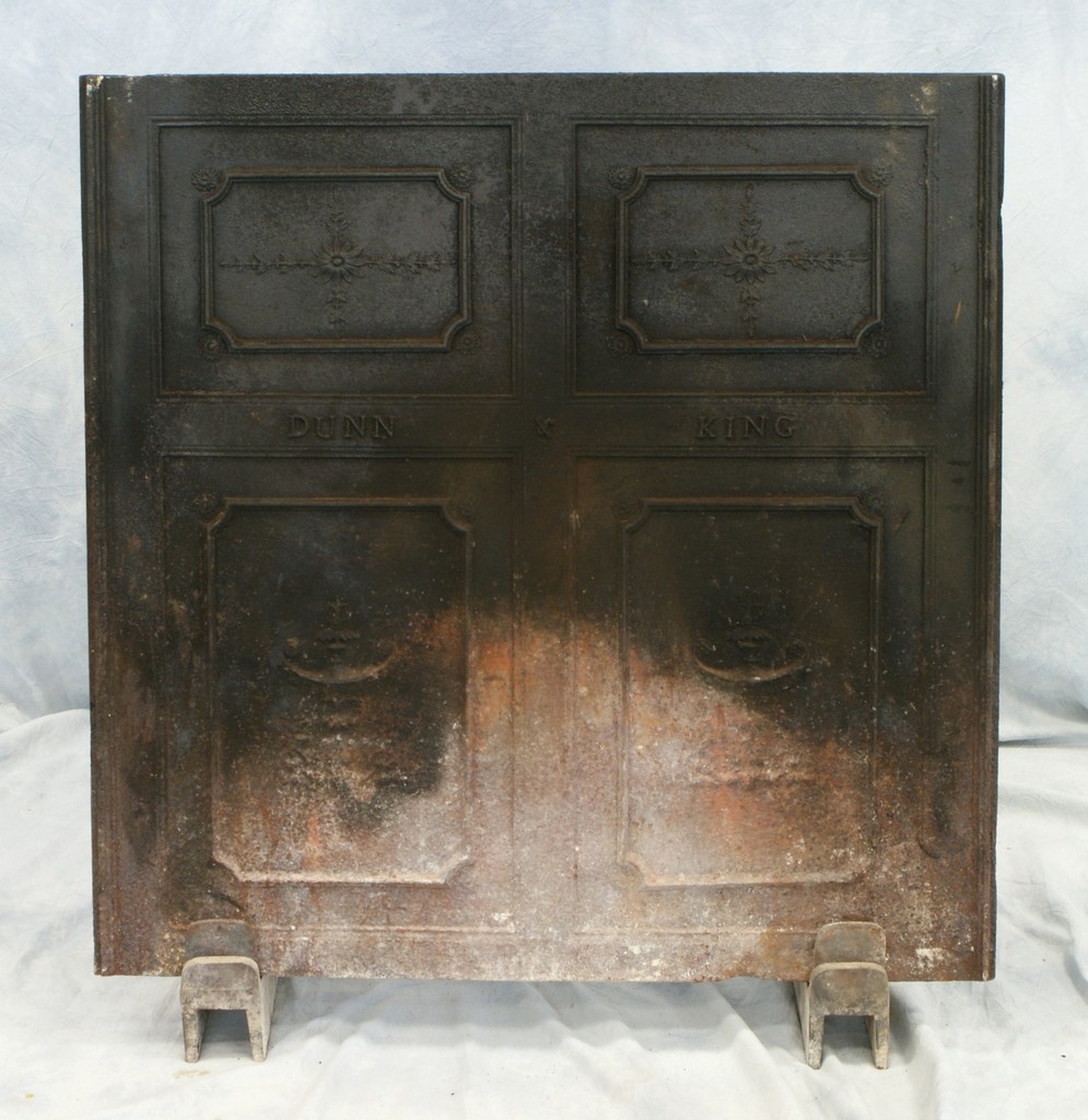 Appraisal: Cast iron fireback panels with urns in bottom two marked