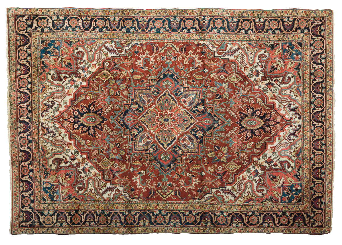 Appraisal: HERIZ CARPET NORTHWEST PERSIA CIRCA The salmon and indigo angular