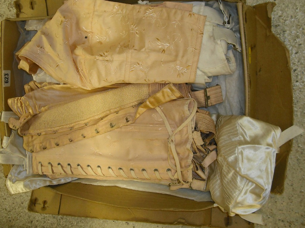 Appraisal: Selection of 's and 's cotton and satin corsets some