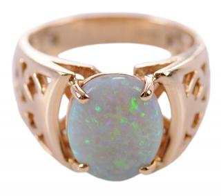 Appraisal: kt Opal Ring modern pierced design center oval opal cabochon