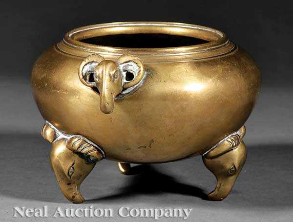 Appraisal: A Chinese Polished Bronze Tripod Censer Xuande mark but probably