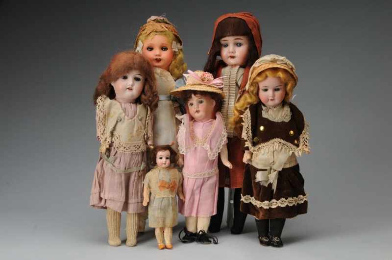 Appraisal: Lot of Dolls in Original Factory Clothing Description Germany Ca