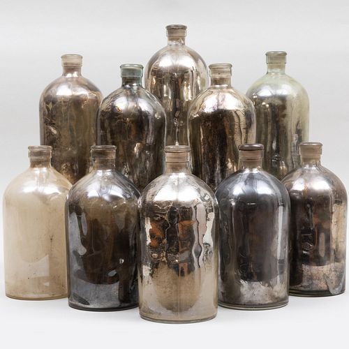 Appraisal: GROUP OF TEN MERCURY GLASS BOTTLESUnmarked x in diam Condition