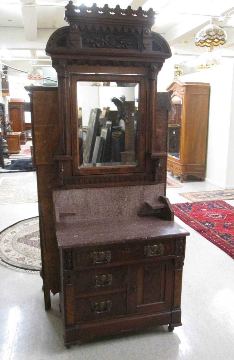 Appraisal: VICTORIAN MARBLE-TOP WASHSTAND COMMODE American c a walnut and burl