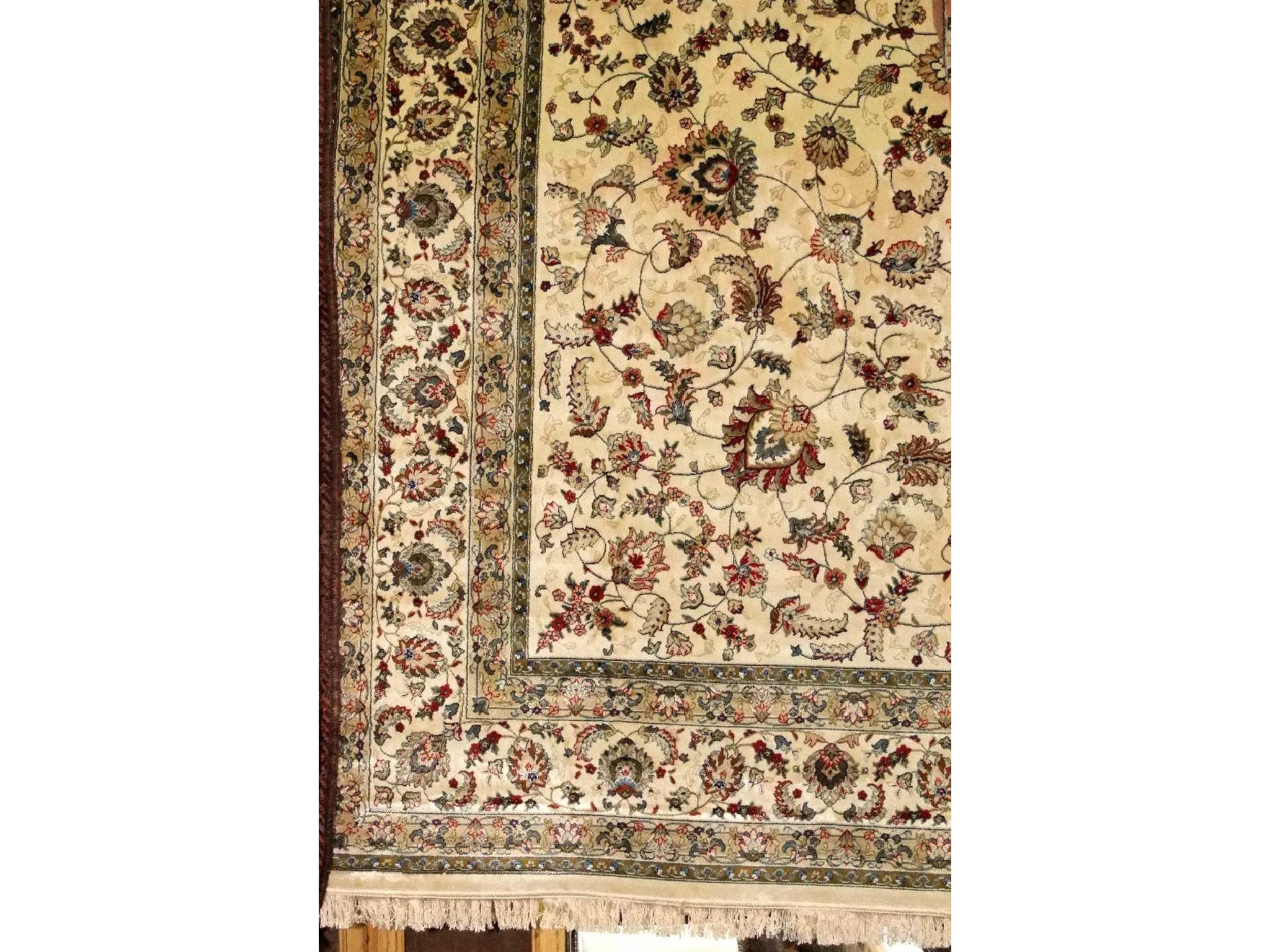 Appraisal: A Persian style white ground carpet with abstract floral detail