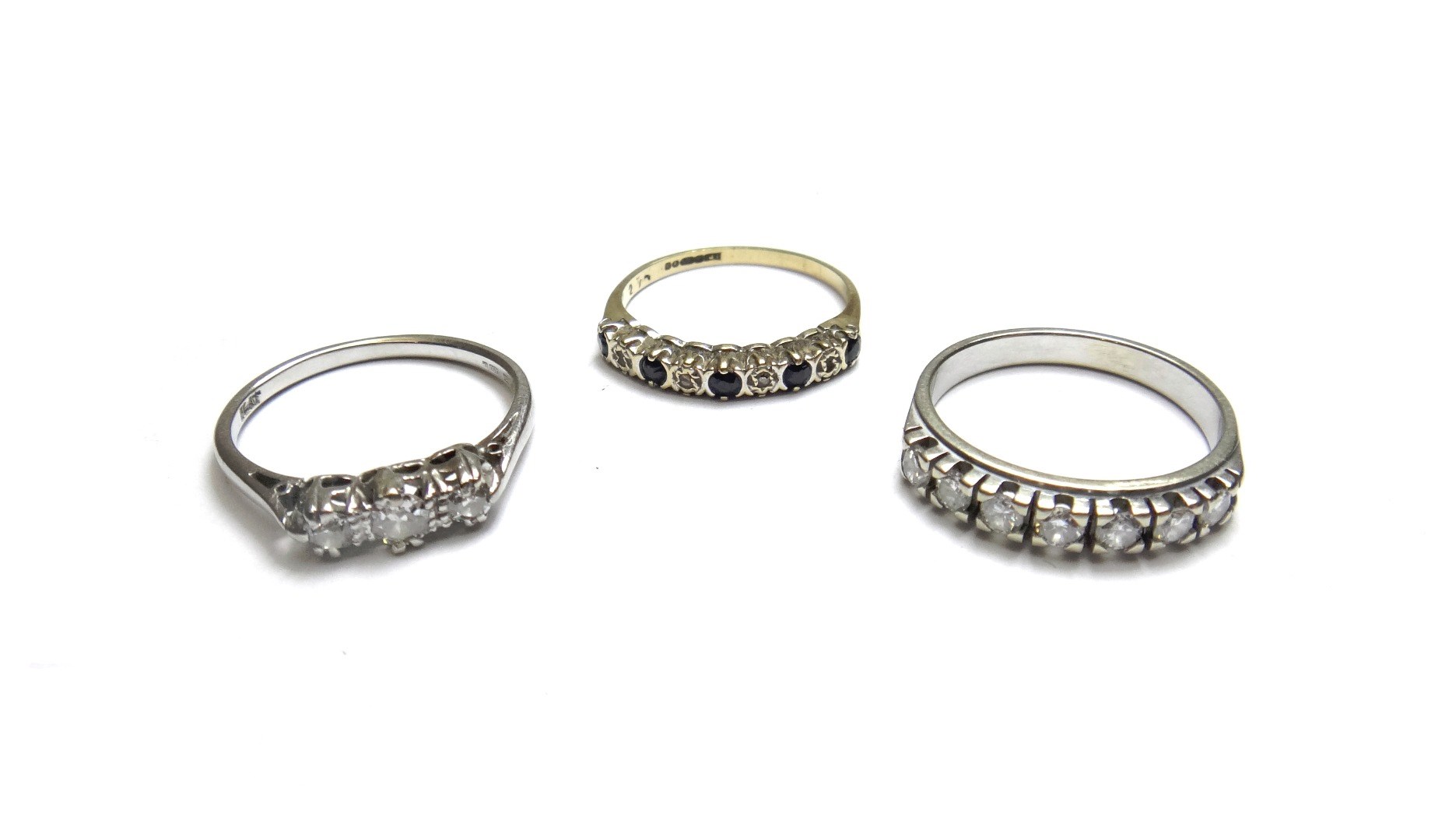 Appraisal: An ct white gold and platinum diamond set three stone