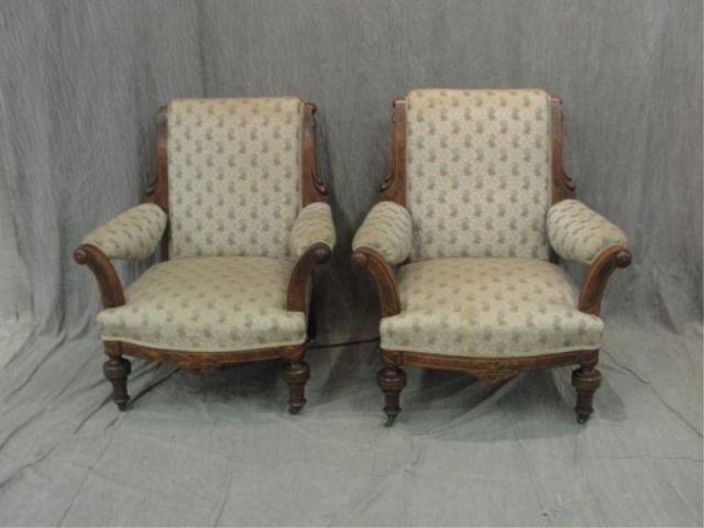 Appraisal: Pair of Victorian Arm Chairs on Casters Reportedly from the