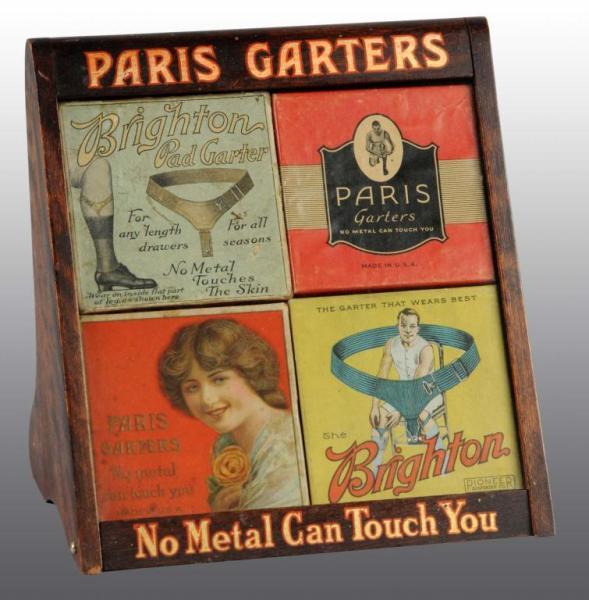 Appraisal: Wooden Paris Garters Counter Display Description Contains two Paris Garter