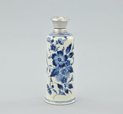 Appraisal: A Dutch Delft Flask with Silver Mounts The glazed ceramic