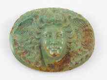 Appraisal: A carved oval turquoise cameo head of Medusa possibly ancient