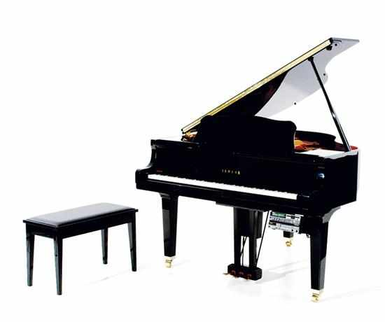 Appraisal: Yamaha black lacquer baby grand piano manufactured serial number J