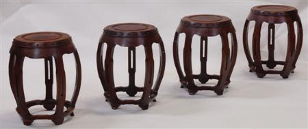 Appraisal: A set of four mahogany circular stools each with a