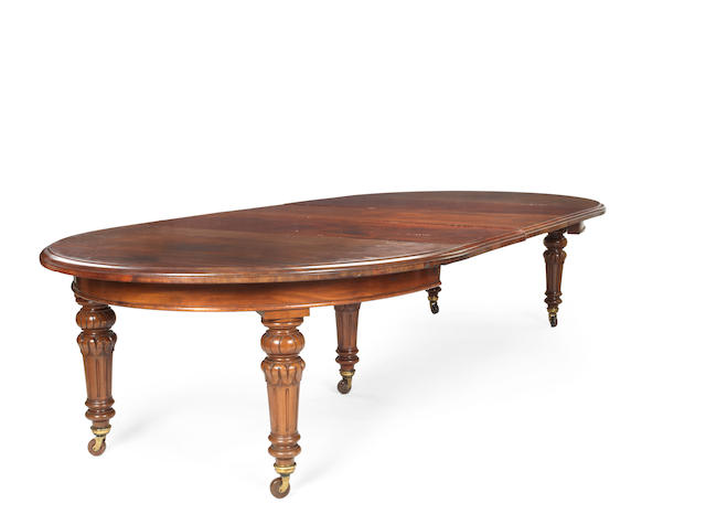 Appraisal: A mid Victorian mahogany extending dining table together with its