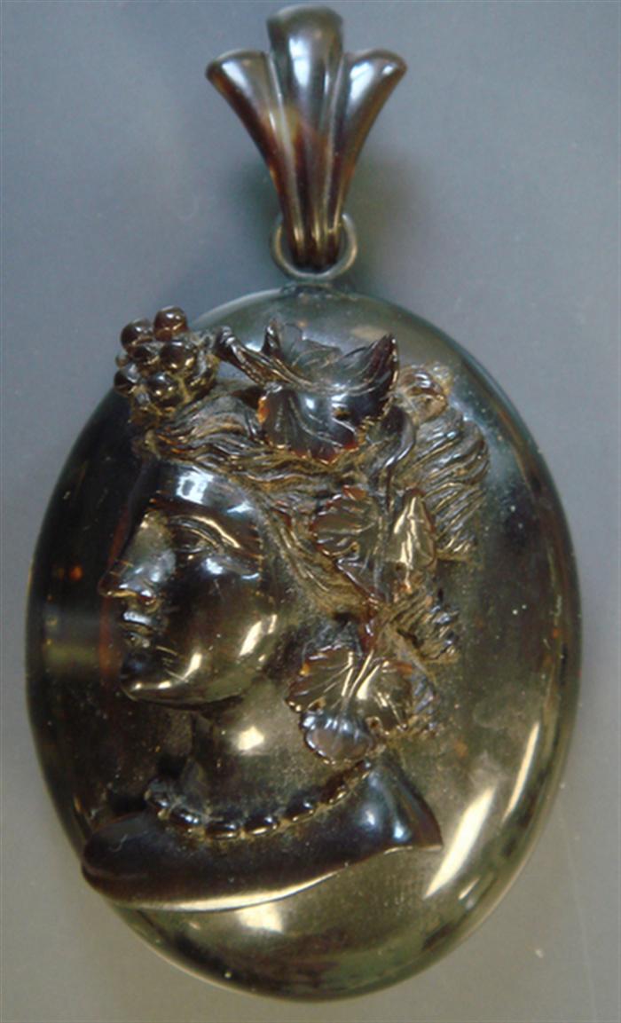 Appraisal: Tortoise Shell Locket Decorated with a large tortoise shell carved