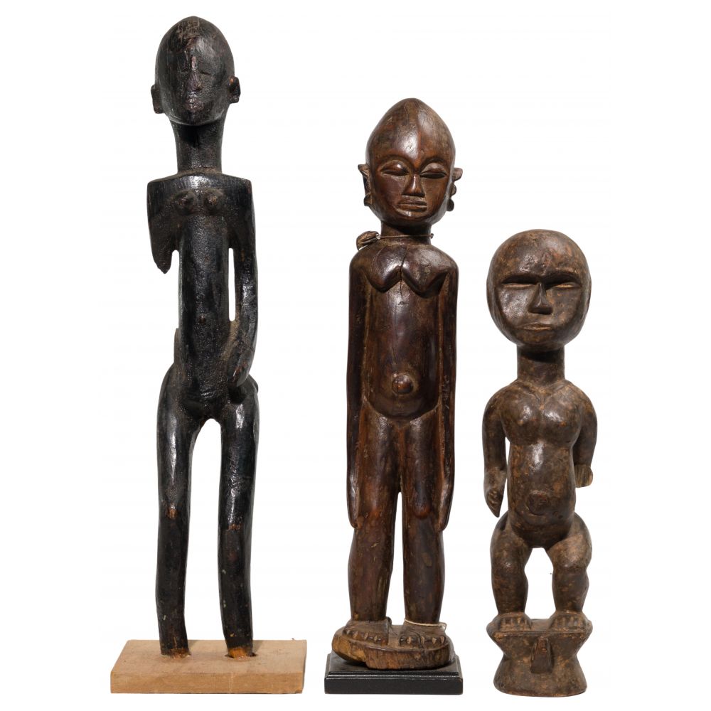 Appraisal: AFRICAN CARVED WOOD FIGURE ASSORTMENT items including a Bete female