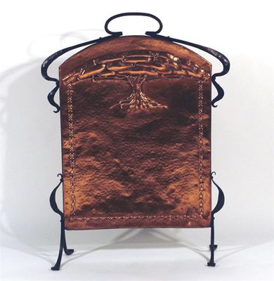 Appraisal: An Arts and Crafts cast iron and copper fire screen