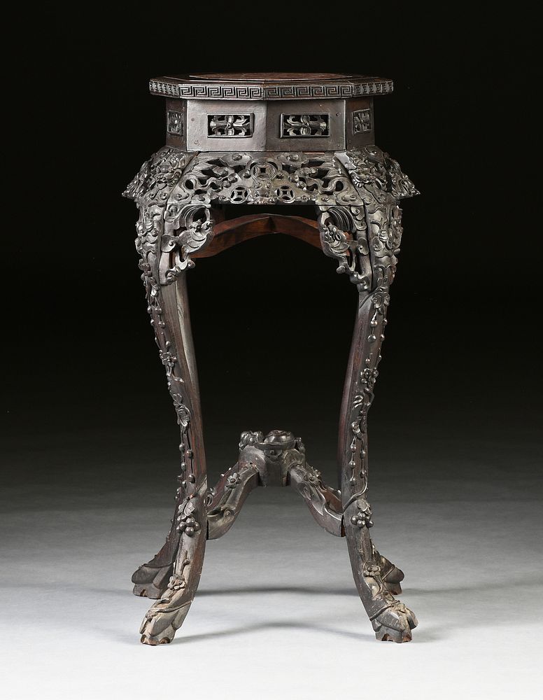 Appraisal: A CHINESE REPUBLIC PERIOD MARBLE TOPPED AND CARVED HARDWOOD PEDESTAL