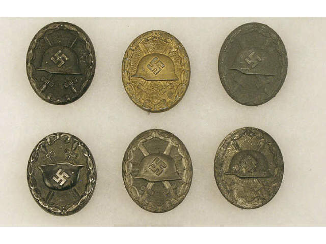 Appraisal: Collection of German WWII wound badges Estimate -